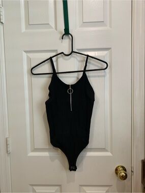 Black Ribbed One-Piece Bodysuit with Front Zip